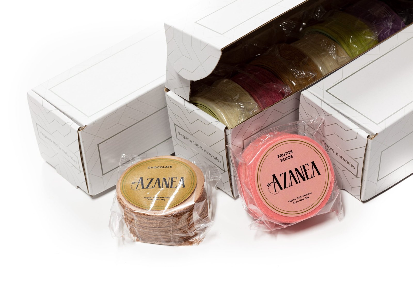 Cajas Azanea con rollos de chocolate y frutos rojos